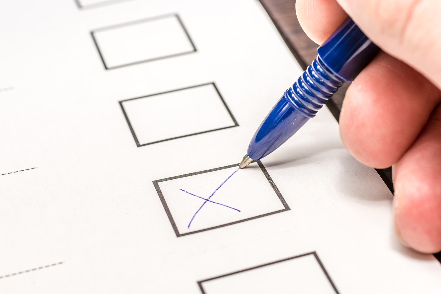With a pen a cross is made to the vote
